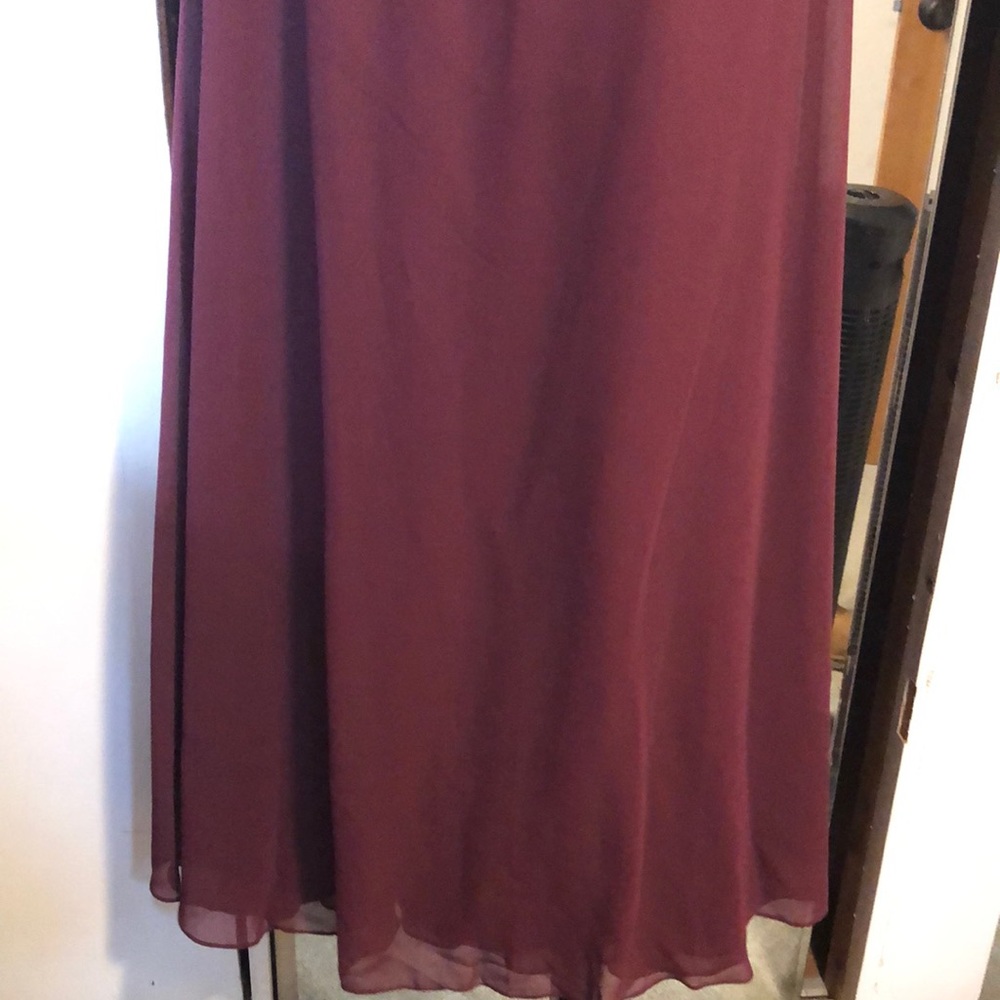 Bridesmaids dress. Never been worn, still has the tags.